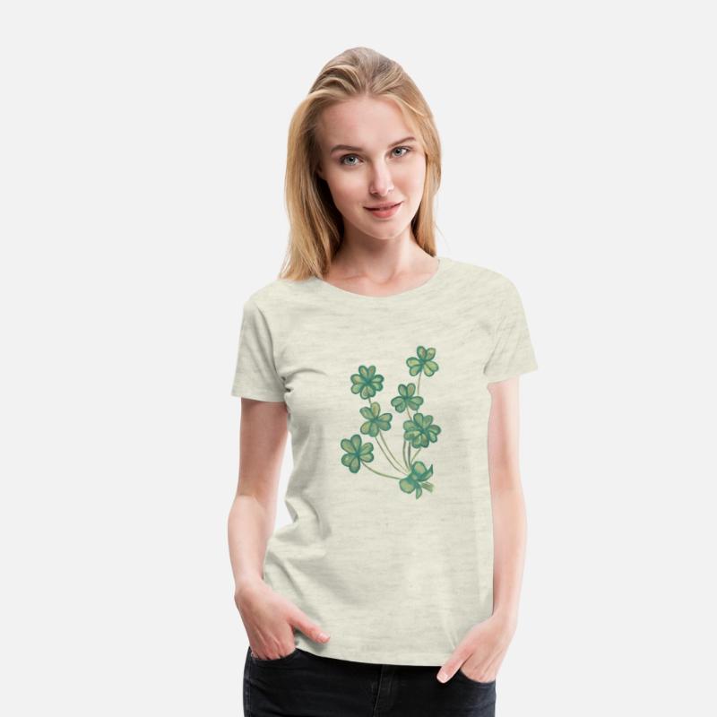A collection of green watercolor clovers