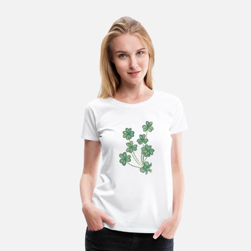 A collection of green watercolor clovers