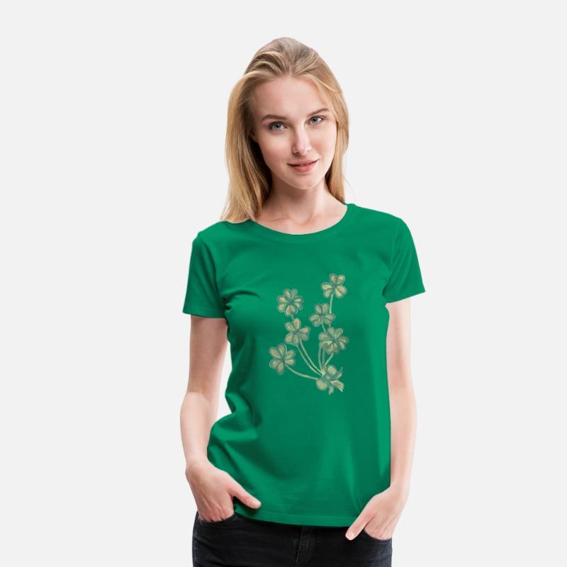 A collection of green watercolor clovers