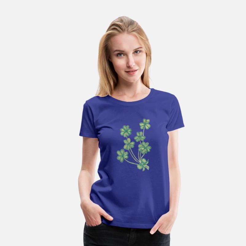 A collection of green watercolor clovers