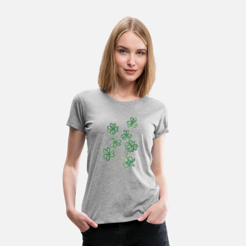 A collection of green watercolor clovers