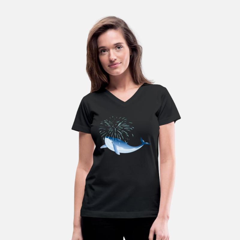 bright blue whale fish in the ocean with fountain