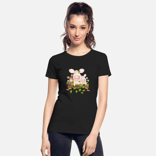 three lucky pigs with four-leaf clovers