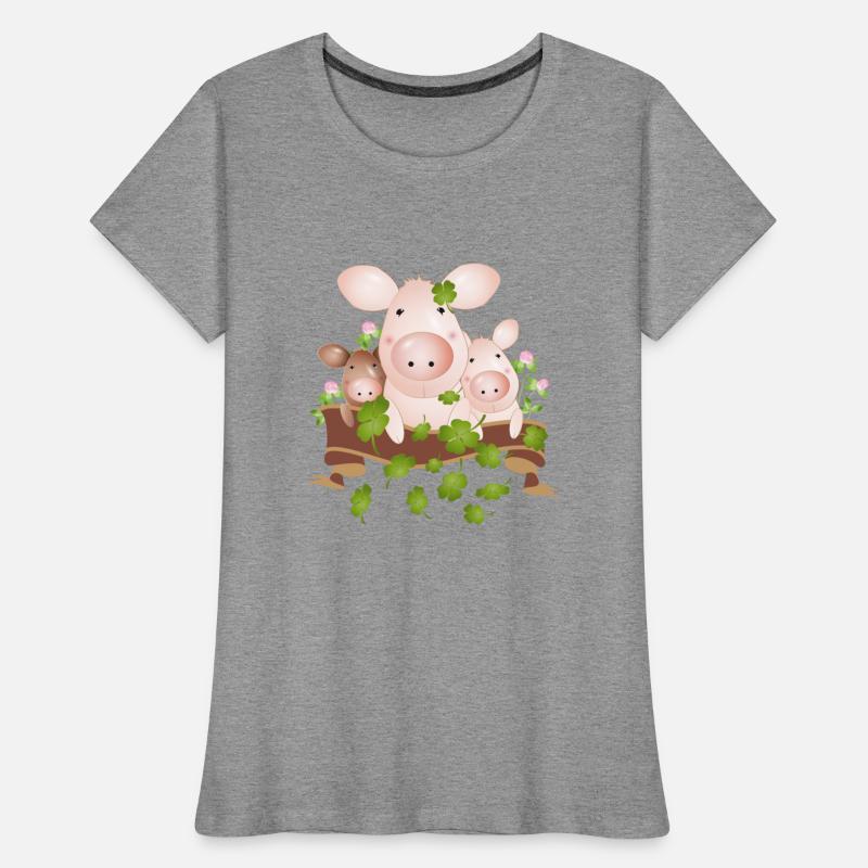 three lucky pigs with four-leaf clovers